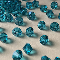 Buy a 3mm Blue Zircon Bicone from Beads’ of’ Nefertari at House of Greco