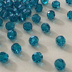 Buy a Blue Zircon ~ 6mm Round from Beads’ of’ Nefertari at House of Greco