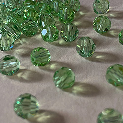 Buy a Peridot ~ 6mm Round from Beads’ of’ Nefertari at House of Greco