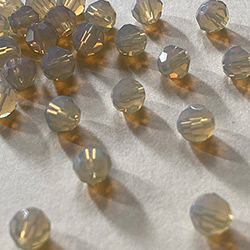 Buy a Sand Opal ~ 6mm Round from Beads’ of’ Nefertari at House of Greco