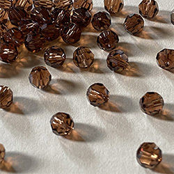 Buy a Smoked Topaz ~ 6mm Round from Beads’ of’ Nefertari at House of Greco