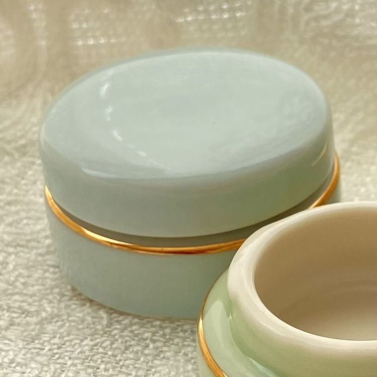 Buy a Porcelain Lip Balm Pill Jar ~ Powder Blue w/ Gold Band from Joe’s General Goods at House of Greco